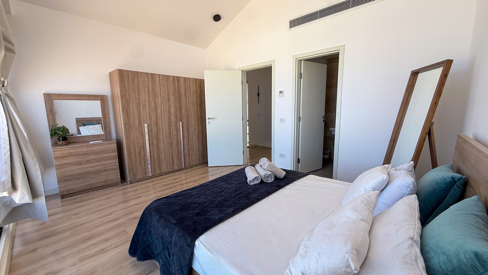 Master bedroom with wardrobe