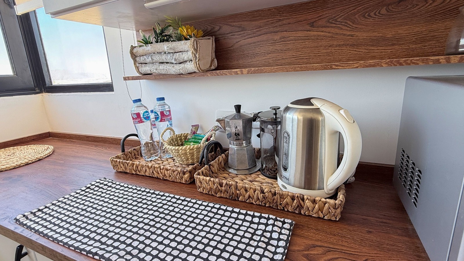 Coffee corner with a kettle, French press and moka pot