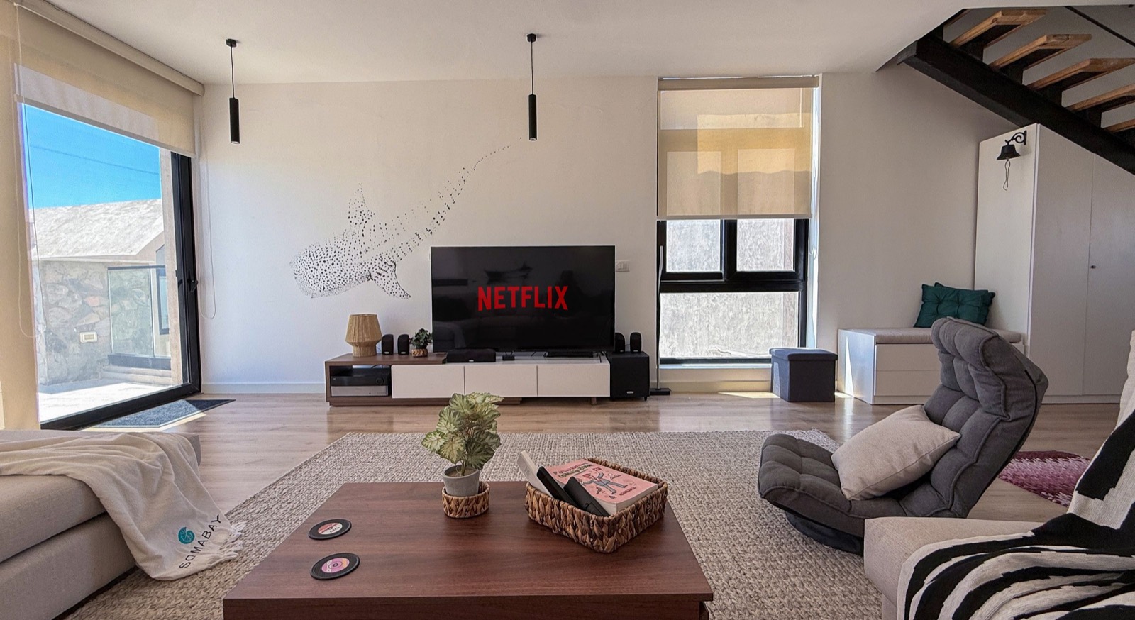 Living room with the Smart TV and corner sofa
