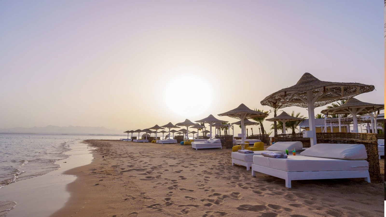 Beach with straw umbrellas