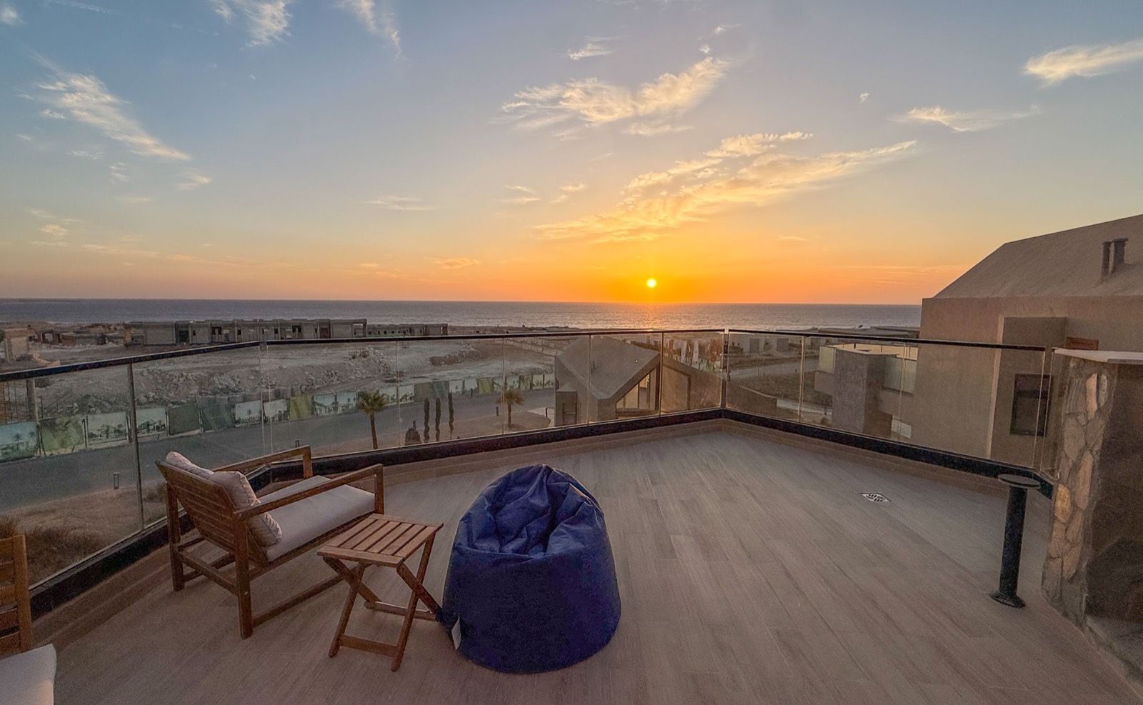 Open terrace with a bean bag at sunrise