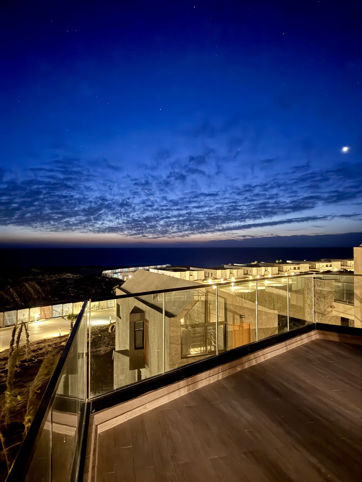 The terrace at night under a deep blue sky