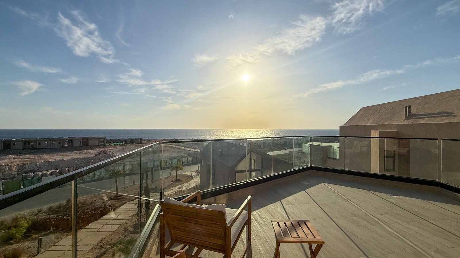 Terrace chairs facing the sea in the morning